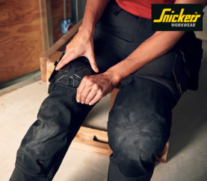 Person putting kneeguard on
