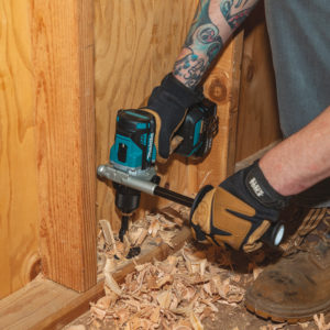Makita drill being used