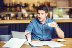 Man looking at his cashflow