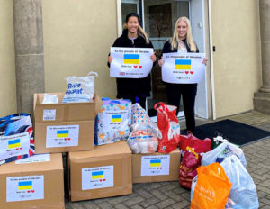 employees with donations for Ukraine