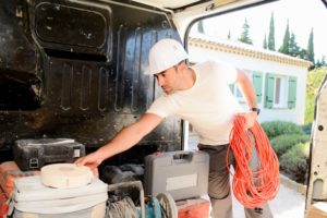 Van drivers filling up van